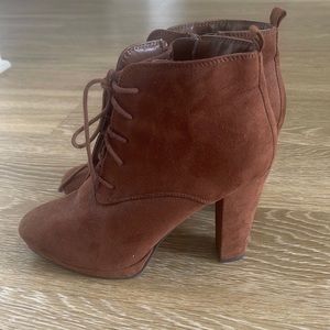 Selling brown suede heeled boots